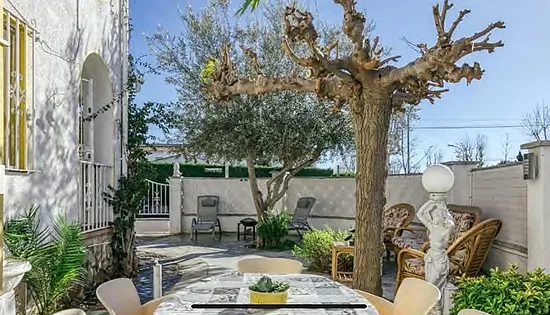 Encantadora casa orientada al sur con jardín y excelente ubicación