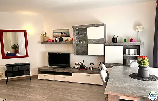 Renovated apartment with large terrace and side view of the canal