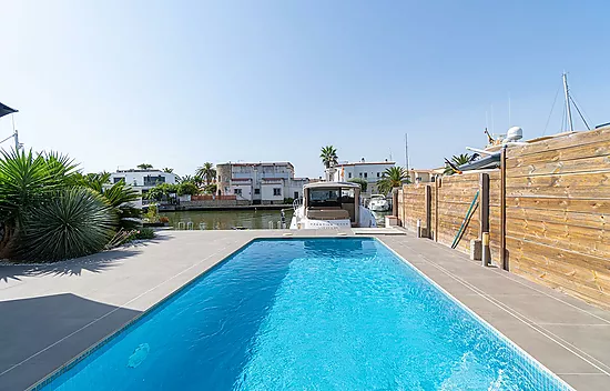 Elegant Waterfront villa with pool, private mooring and direct canal access in Santa Margarita