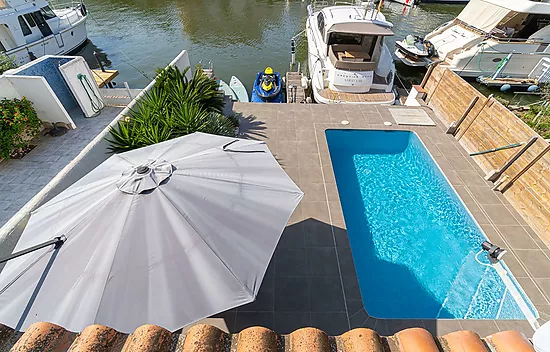 Elegant Waterfront villa with pool, private mooring and direct canal access in Santa Margarita