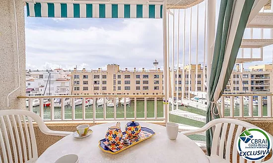 PORT MOXÓ Charming 2-bedroom apartment with canal views, solarium and private outdoor parking