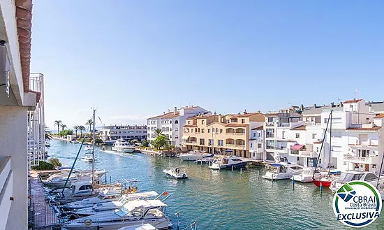 PORT MOXÓ Charming 2-bedroom apartment with canal views, solarium and private outdoor parking