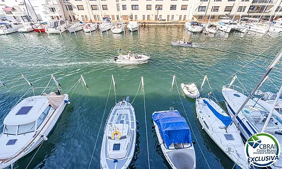 PORT MOXÓ Charming 2-bedroom apartment with canal views, solarium and private outdoor parking