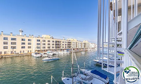 PORT MOXÓ Charming 2-bedroom apartment with canal views, solarium and private outdoor parking