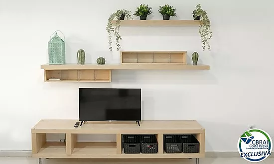 Appartement moderne au rez-de-chaussée dans une résidence avec jardins et piscine communautaire