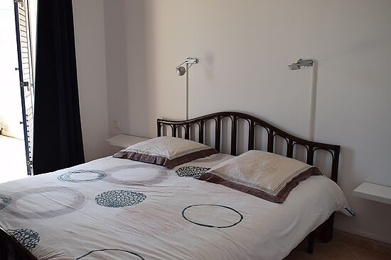 Maison avec amarre privée en location, 8 personnes et parking à Empuriabrava.