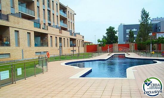 PUIG ROM  Apartment with community pool, parking and solarium